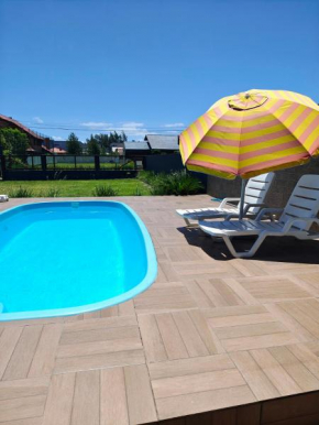 Casa ,piscina há 100 metros do mar ,20 pessoas